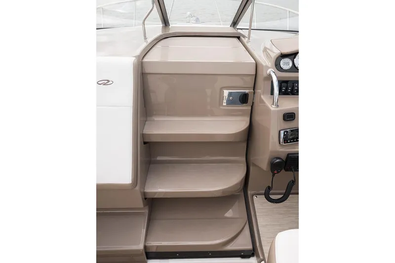 Slide: The Image of Manufacturer Provided Image: 2025 Regal 26 Express boat interior steps and control panel. - 6