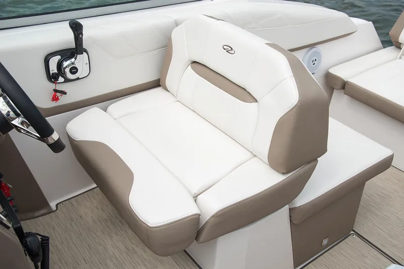 Slide: The Image of Manufacturer Provided Image: 2025 Regal 26 Express boat interior with beige and white seating. - 7