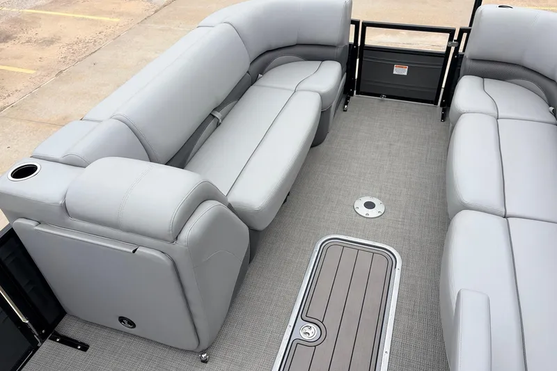 Slide: The Image of Luxurious seating on 2022 Regency 250 DL3 pontoon boat with gray upholstery. - 13