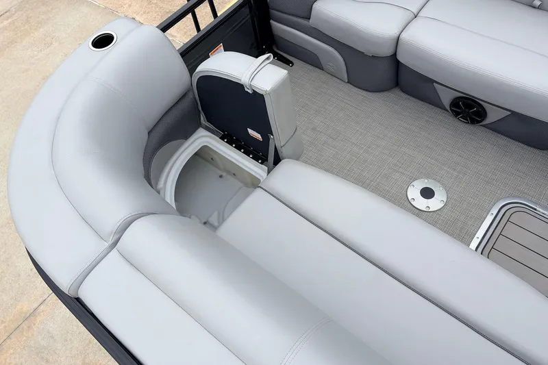 Slide: The Image of Luxurious seating and storage on 2022 Regency 250 DL3 pontoon boat. - 17
