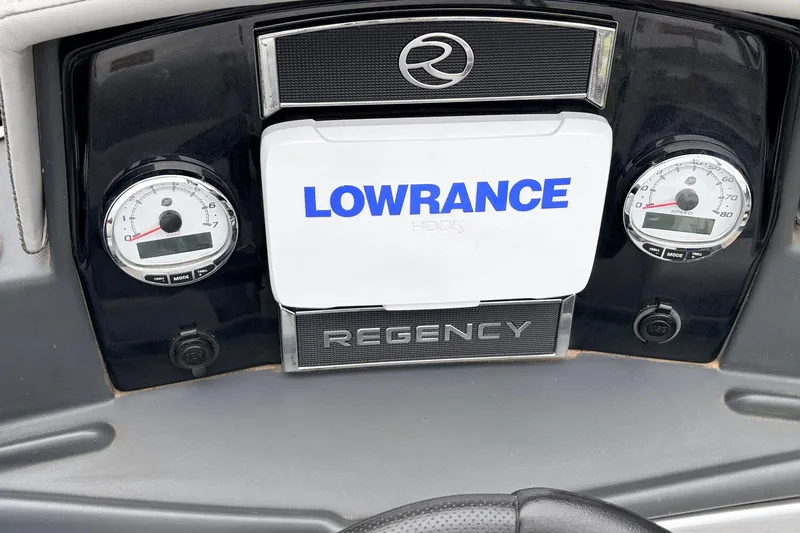 Slide: The Image of Dashboard of 2022 Regency 250 DL3 boat with Lowrance display and gauges. - 34
