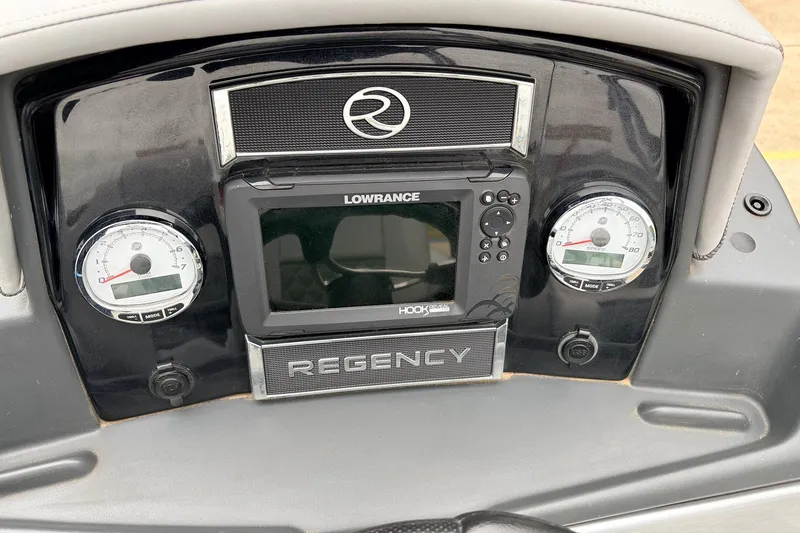 Slide: The Image of Dashboard of 2022 Regency 250 DL3 boat with Lowrance display and gauges. - 35