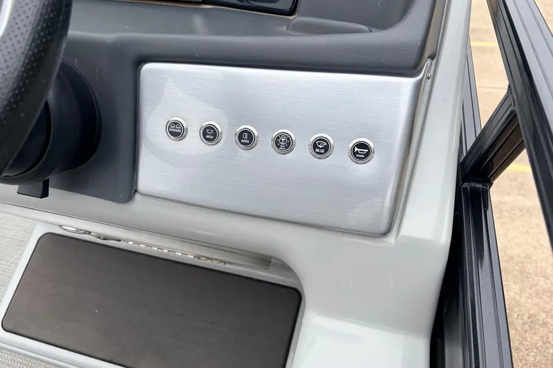Slide: The Image of Control panel of 2022 Regency 250 DL3 boat with labeled buttons. - 37