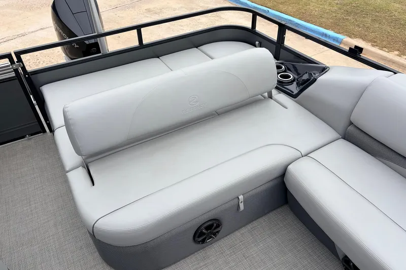 Slide: The Image of 2022 Regency 250 DL3 boat interior with gray seating and cup holders. - 42
