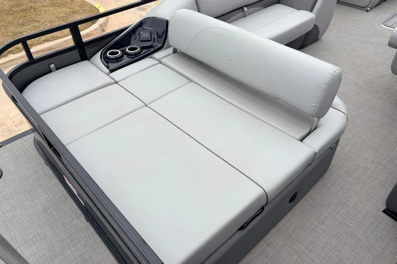 Slide: The Image of Luxurious seating area on 2022 Regency 250 DL3 pontoon boat with cup holders. - 44