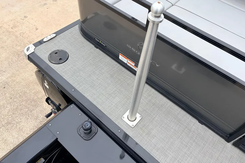 Slide: The Image of 2022 Regency 250 DL3 boat deck with pole and storage compartments. - 51