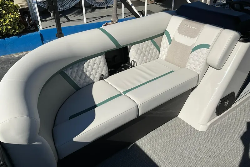 Slide: The Image of Luxurious seating on 2026 Crest Conquest 230 SLSC boat with elegant upholstery design. - 14