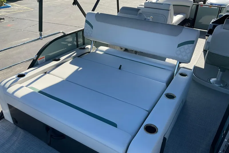 Slide: The Image of 2026 Crest Conquest 230 SLSC boat interior with spacious seating and cup holders. - 17