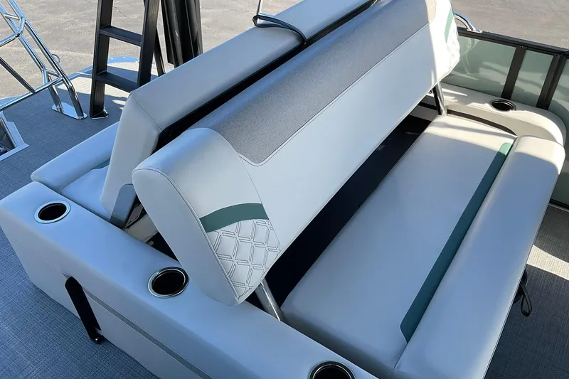 Slide: The Image of 2026 Crest Conquest 230 SLSC boat seating with cup holders and stylish upholstery. - 19