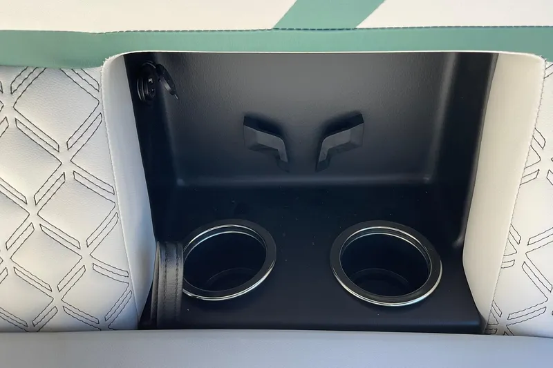 Slide: The Image of Cup holders in 2026 Crest Conquest 230 SLSC boat with stylish upholstery design. - 32