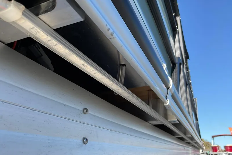 Slide: The Image of Close-up of 2026 Crest Conquest 230 SLSC exterior detailing with LED lighting. - 38