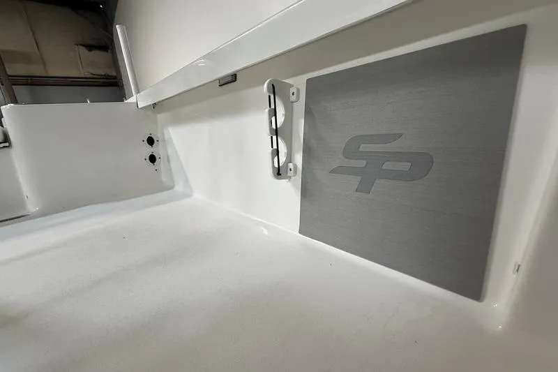 Slide: The Image of 2026 Sea Pro 250 Bay boat interior with logo detail. - 22