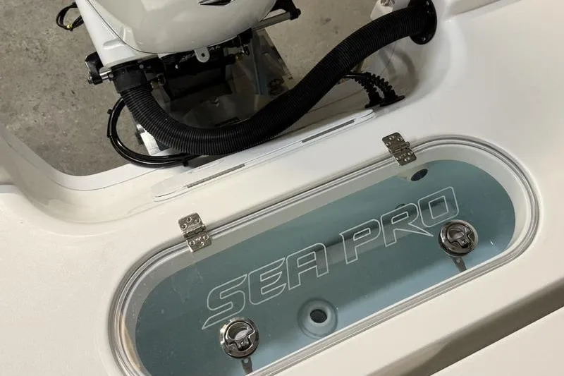Slide: The Image of 2026 Sea Pro 250 Bay boat livewell with logo, showcasing sleek design and functionality. - 6