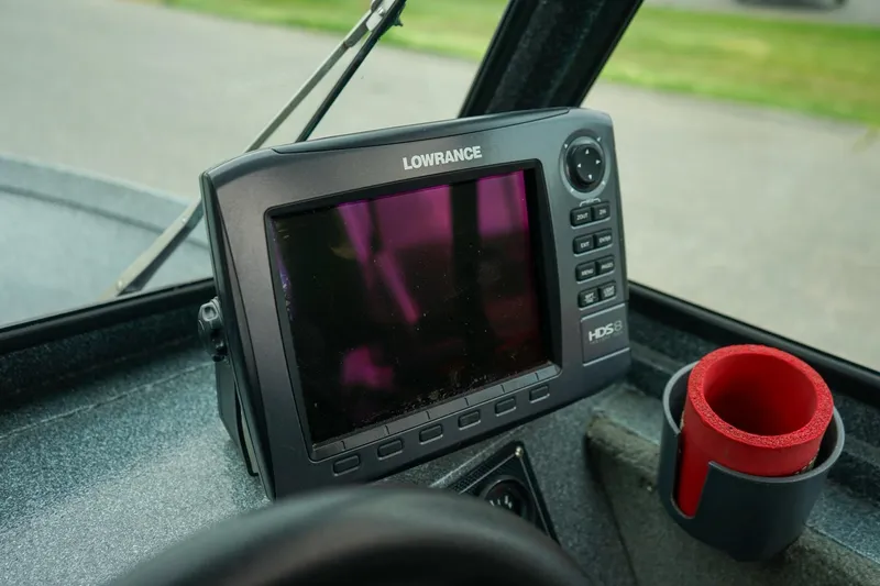 Slide: The Image of Lowrance HD5 fishfinder on 2010 Alumaweld Stryker Sport 20 boat dashboard. - 15