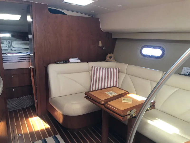 Slide: The Image of Interior of 2009 Tiara Yachts 4300 Sovran with leather seating. - 17