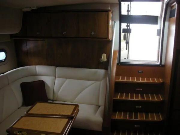 Slide: The Image of Interior of 2009 Tiara Yachts 4300 Sovran with seating and stairs. - 18