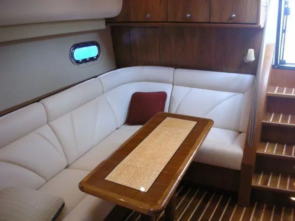 Slide: The Image of Interior of 2009 Tiara Yachts 4300 Sovran with elegant seating area. - 20