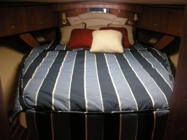 Slide: The Image of Interior of 2009 Tiara Yachts 4300 Sovran with cozy bed. - 23