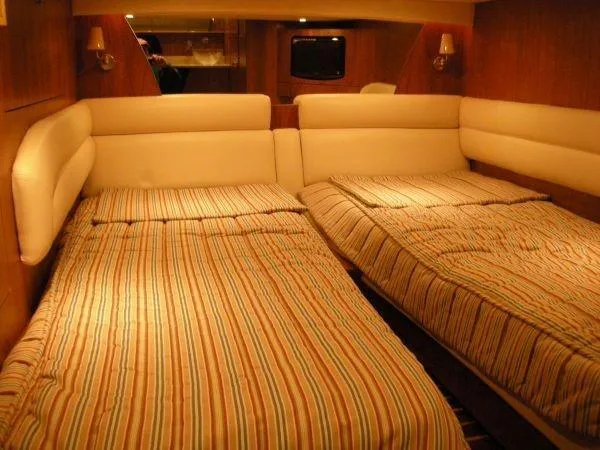 Slide: The Image of Interior of 2009 Tiara Yachts 4300 Sovran with twin beds. - 28