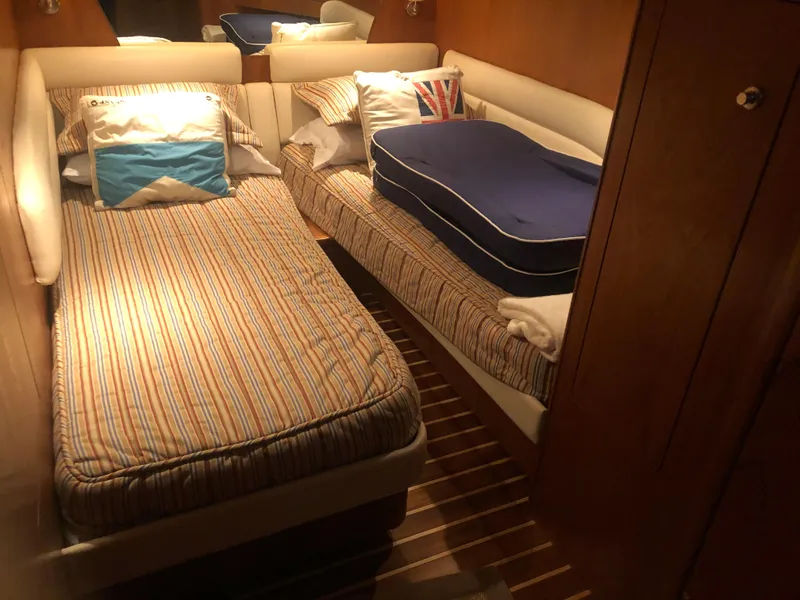 Slide: The Image of Interior of 2009 Tiara Yachts 4300 Sovran with twin beds. - 30