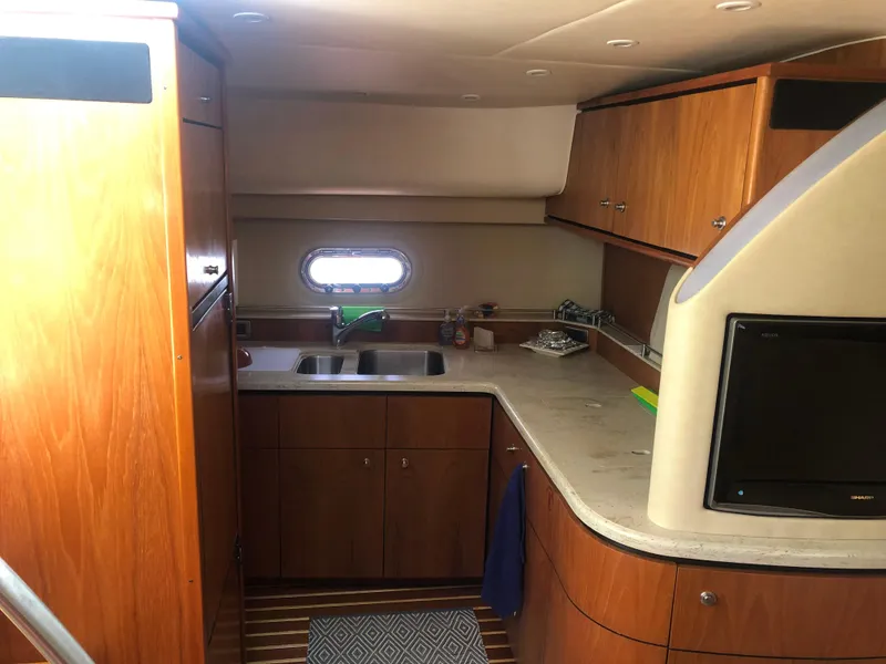 Slide: The Image of Interior of 2009 Tiara Yachts 4300 Sovran featuring modern kitchen. - 31