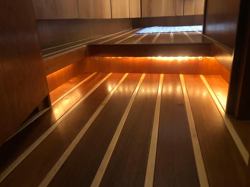 Slide: The Image of Interior of 2009 Tiara Yachts 4300 Sovran with illuminated wooden flooring. - 33