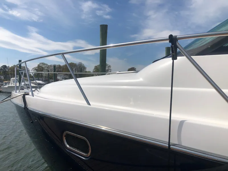 Slide: The Image of 2009 Tiara Yachts 4300 Sovran at dock, side view. - 38