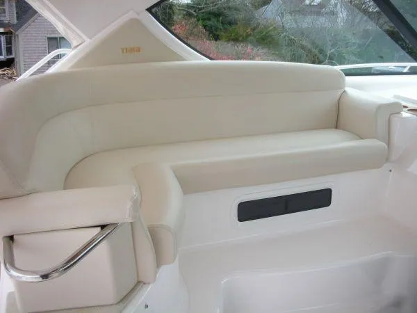Slide: The Image of Interior of 2009 Tiara Yachts 4300 Sovran with beige seating area. - 8