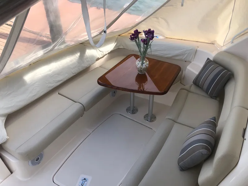 Slide: The Image of Interior of 2009 Tiara Yachts 4300 Sovran with elegant seating area. - 9