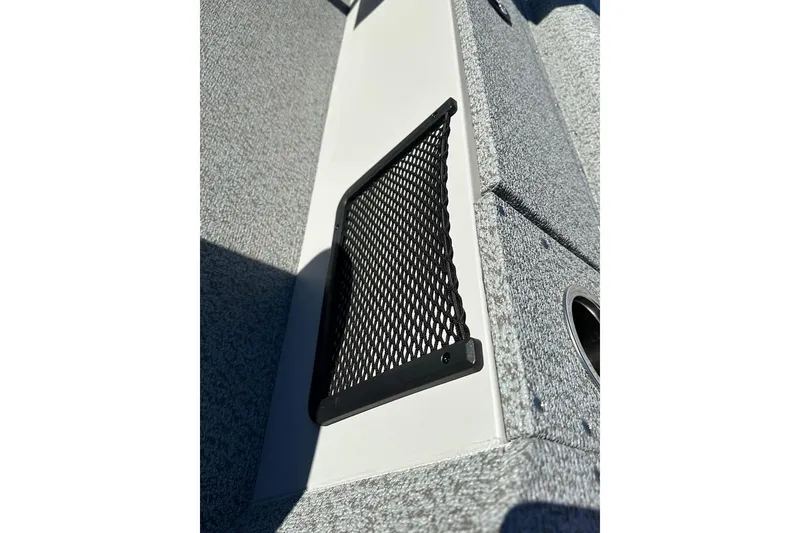 Slide: The Image of Mesh storage pocket on 2026 Smoker Craft Angler 16 SC boat interior. - 16