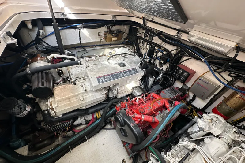 Slide: The Image of Engine room of a 2000 Pursuit 3400 Express boat with Volvo Penta engine. - 18