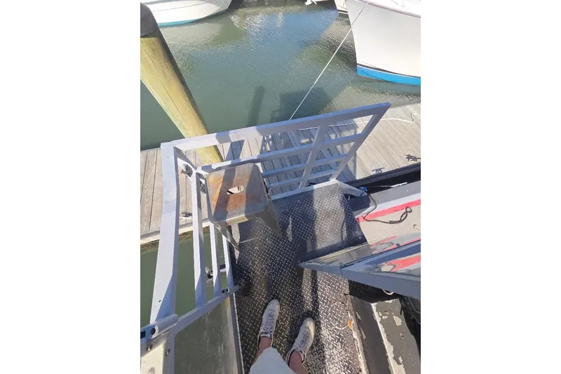 Slide: The Image of Amphibious Marine Landing Craft from 2012 at a dock. - 10