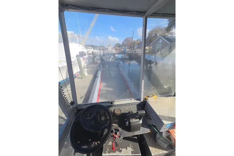 Slide: The Image of Interior view of a 2012 Cool Amphibious Manufacturers International Landing Craft at a dock. - 12