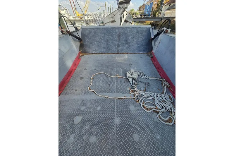 Slide: The Image of Interior of 2012 Cool Amphibious Manufacturers International Landing Craft with ropes and metal flooring. - 16