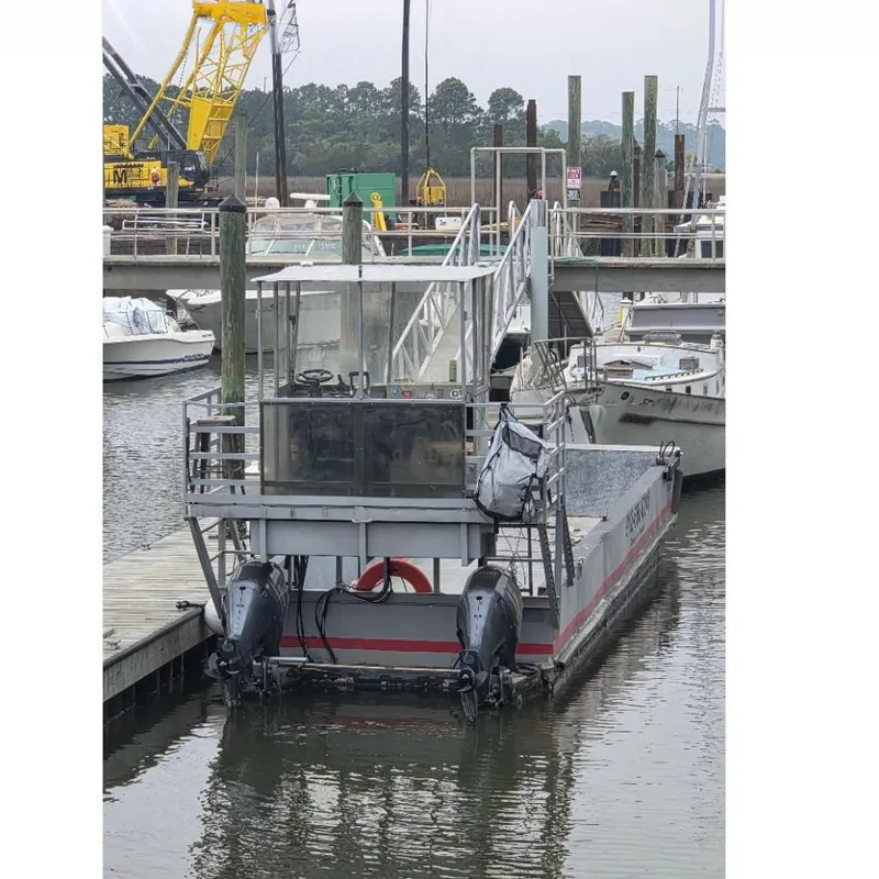 Slide: The Image of 2012 Amphibious Marine Landing Craft docked at harbor. - 3