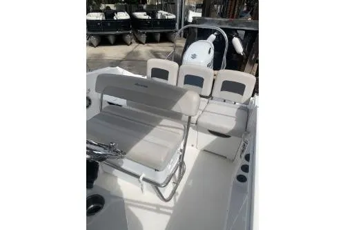 Slide: The Image of 2021 Hurricane Center Console 19 OB boat interior with seating and steering console. - 8