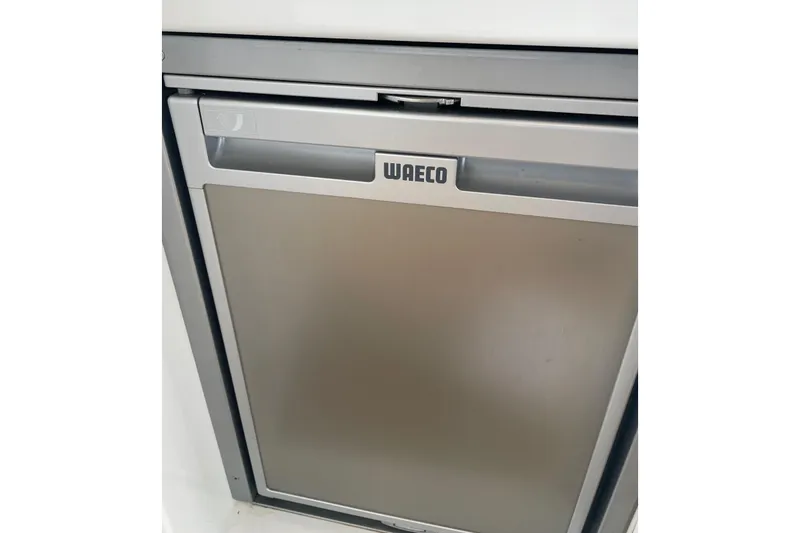 Slide: The Image of Waeco refrigerator on 2017 Jeanneau Leader 46 yacht, sleek stainless steel design. - 11