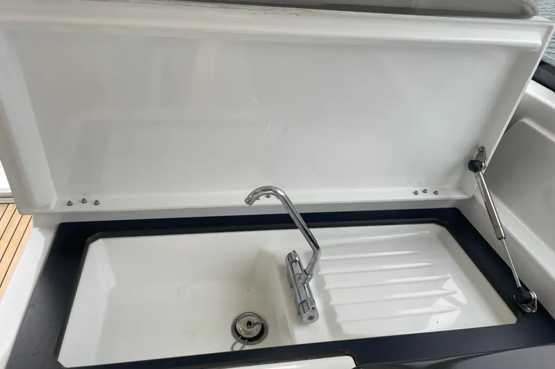Slide: The Image of Open sink area on 2017 Jeanneau Leader 46 yacht, featuring a sleek faucet design. - 12