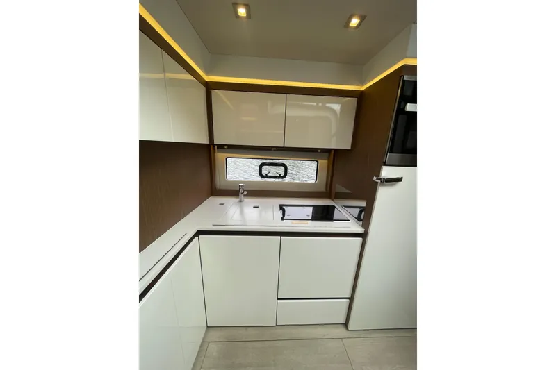 Slide: The Image of Modern kitchen on Jeanneau Leader 46 yacht, year 2017. - 46