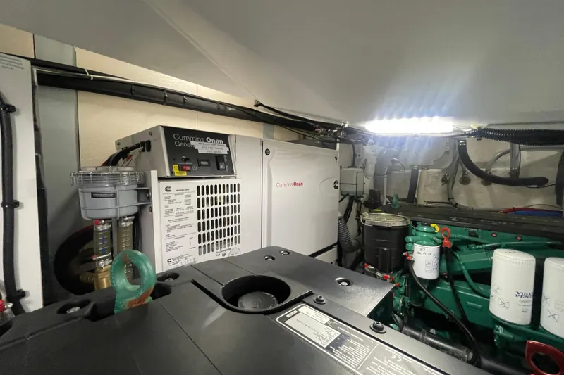 Slide: The Image of Engine room of 2017 Jeanneau Leader 46 with Cummins Onan generator and Volvo Penta components. - 61