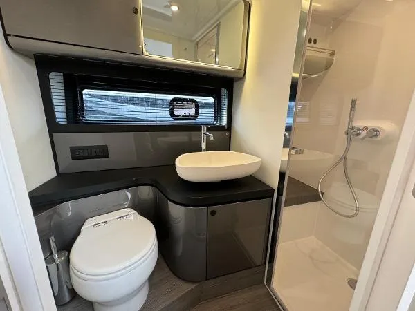 Slide: The Image of Luxurious bathroom in 2024 Azimut Verve 42 yacht with modern fixtures and shower. - 12