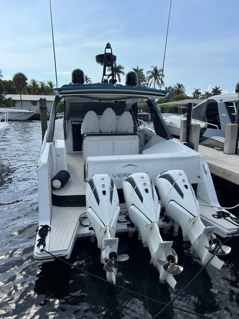 Slide: The Image of 2024 Azimut Verve 42 yacht docked with triple outboard engines. - 3