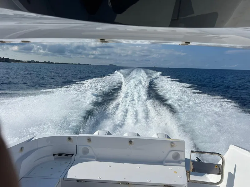 Slide: The Image of 2024 Azimut Verve 42 cruising on open sea, leaving a wake behind. - 4