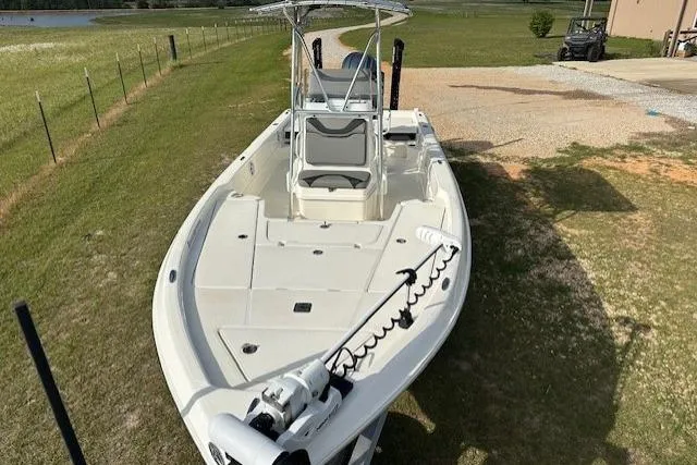 Slide: The Image of 2023 Skeeter SX240 boat on grass, featuring a sleek design and modern equipment. - 4