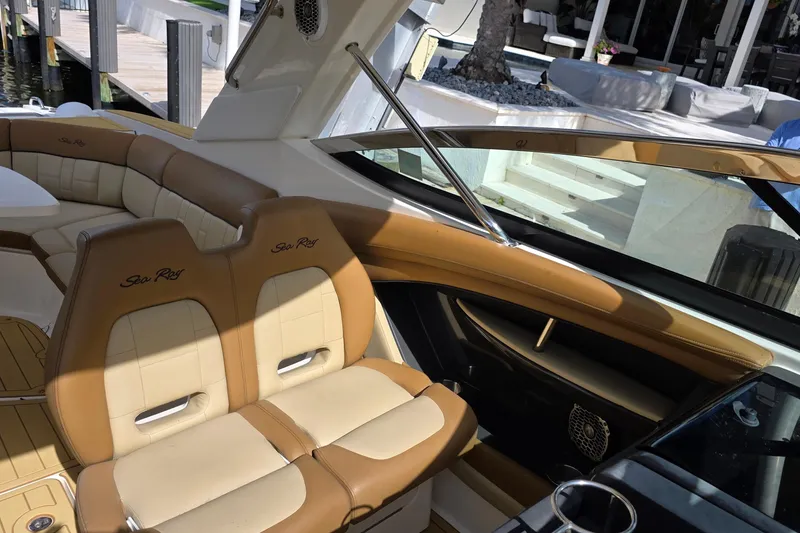 Slide: The Image of Luxurious 2015 Sea Ray SLX 350 boat interior with tan leather seating. - 28