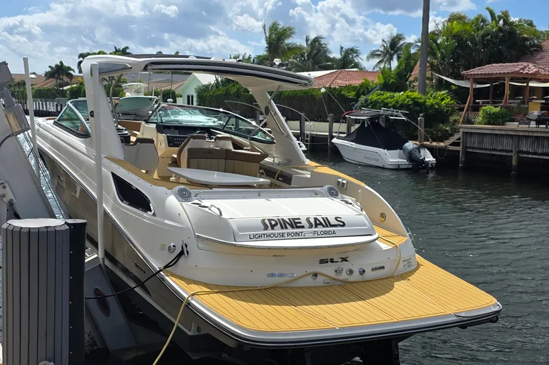 Slide: The Image of 2015 Sea Ray SLX 350 boat docked in Lighthouse Point, Florida canal. - 3