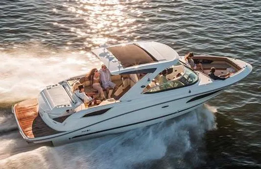 Slide: The Image of Manufacturer Provided Image: 2015 Sea Ray 350 SLX cruising on water with passengers. - 5