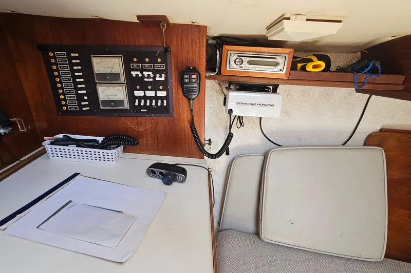 Slide: The Image of 1979 Morgan 382 yacht interior with navigation equipment and communication devices. - 32
