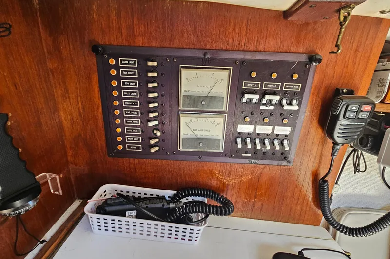Slide: The Image of Electrical panel of a 1979 Morgan 382 sailboat with gauges and switches. - 34