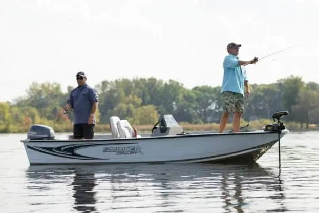 Slide: The Image of Manufacturer Provided Image: 2026 Smoker Craft Angler 16 SC boat with two people fishing on a calm lake. - 22